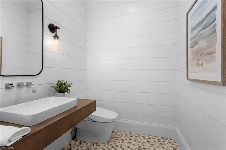 Half bath with toilet and vanity