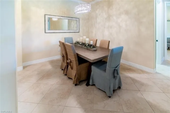 Dining room featuring light tile patterned floors