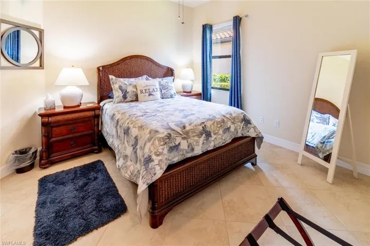 Bedroom featuring light tile patterned flooring
