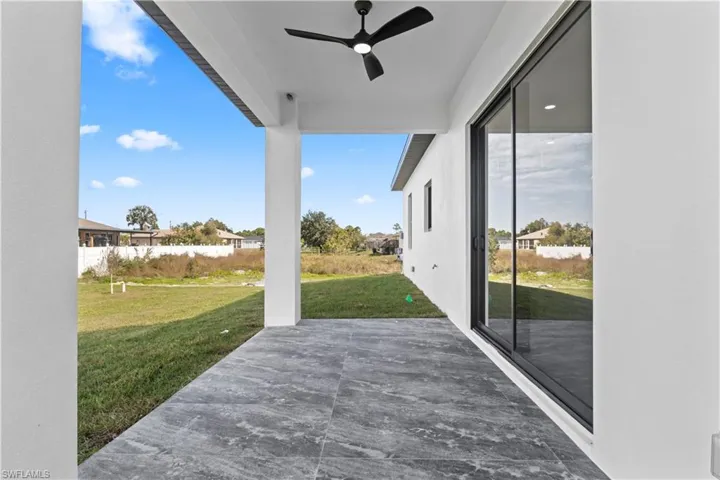 View of patio with ceiling fan