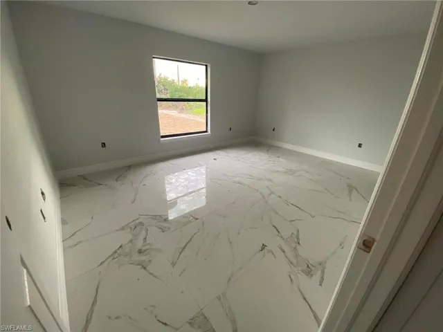 View of tiled spare room