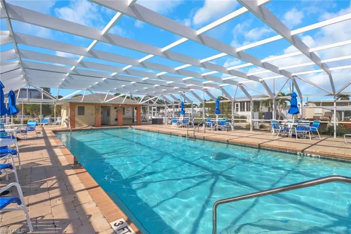 View of pool featuring a patio and a lanai