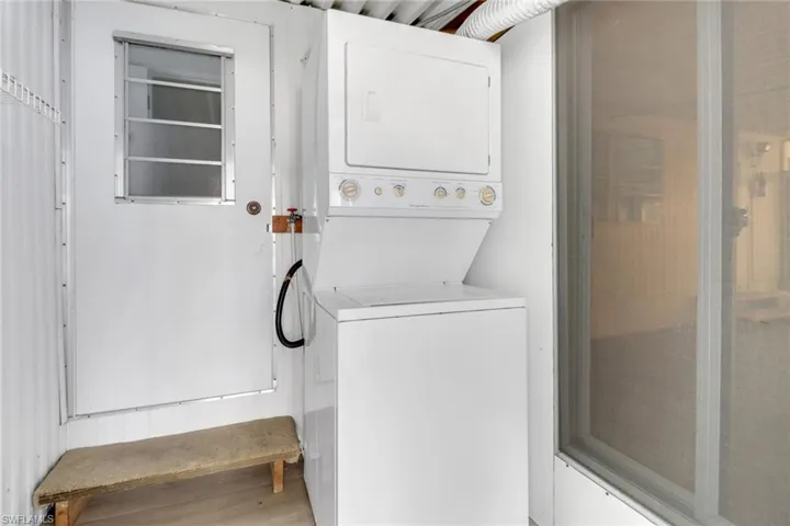 Laundry room with stacked washer / drying machine