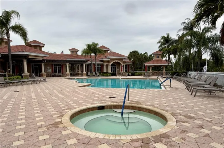 Relax in this Hot Tub featuring a gazebo, and patio area