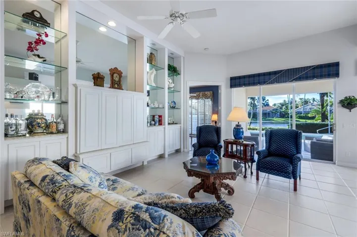 Tiled living room with ceiling fan