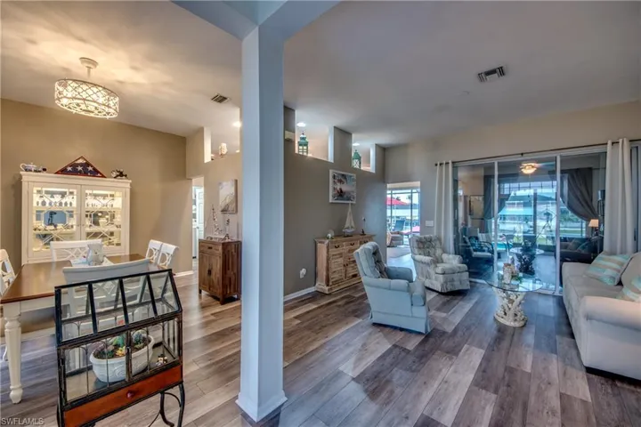 Living room featuring a chandelier and hardwood / wood-style floors