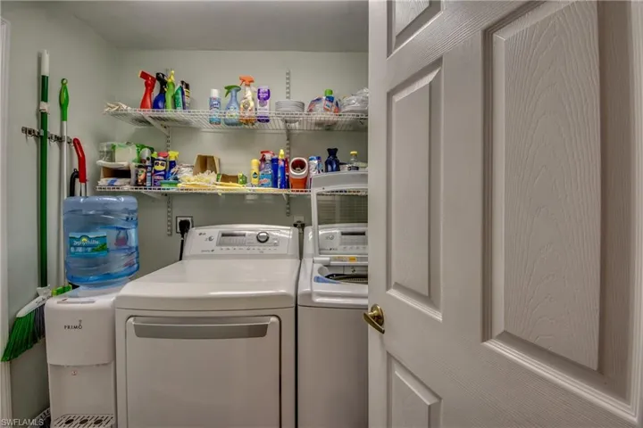 Laundry area featuring separate washer and dryer