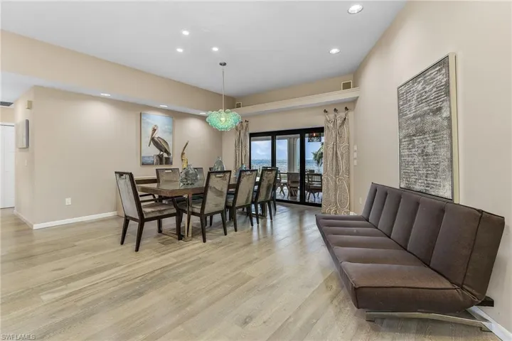 Dining room featuring french doors and light hardwood / wood-style flooring