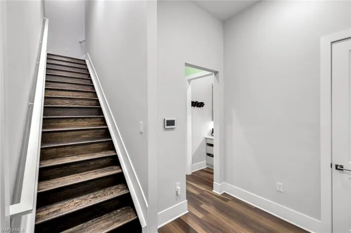 Mud room and back stairwell to upper level