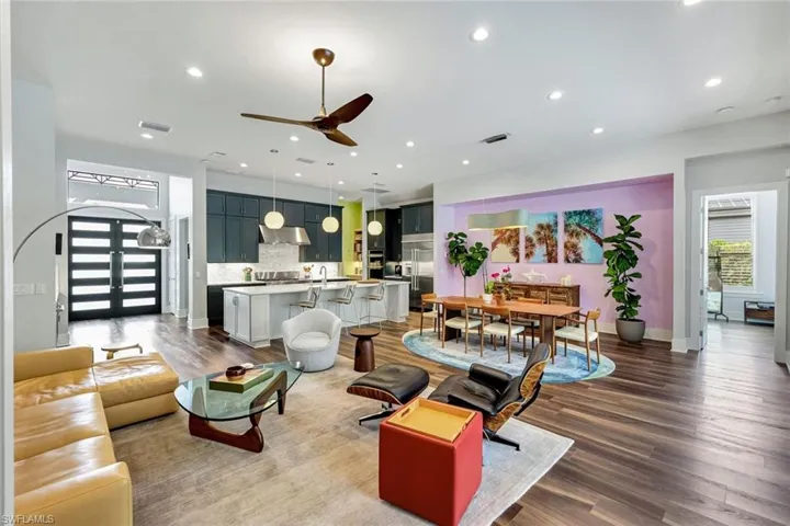 Great room under soaring volume ceilings