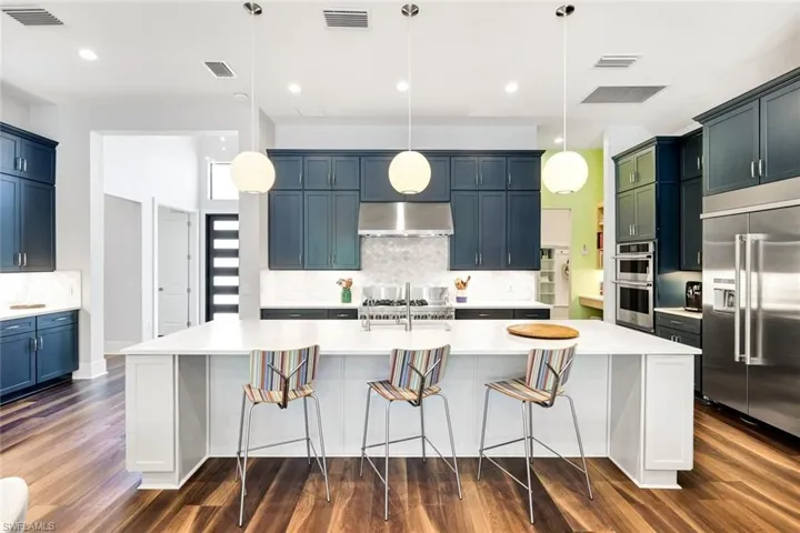 Fully equipped kitchen with immense quartz-topped island