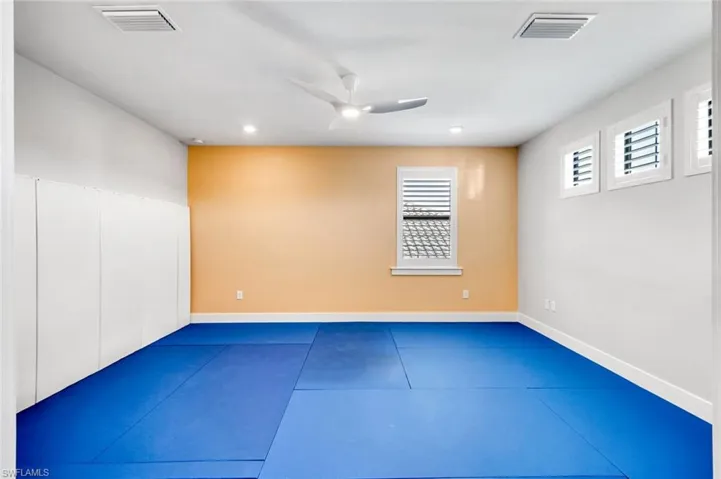 Upstairs den currently used as a fitness room