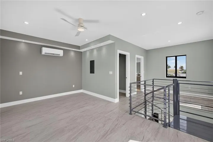 71 Mango Unit 1 Bedroom upper level space featuring wood-finish flooring and recessed lighting