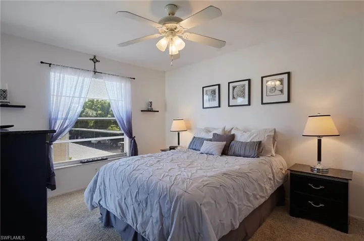 Bedroom with carpet flooring and ceiling fan