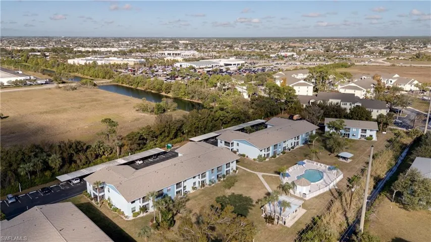 Aerial view of residential area with a nearby body of water