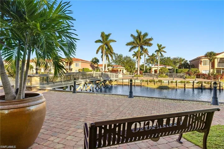 Surrounding community with a water view and a residential view