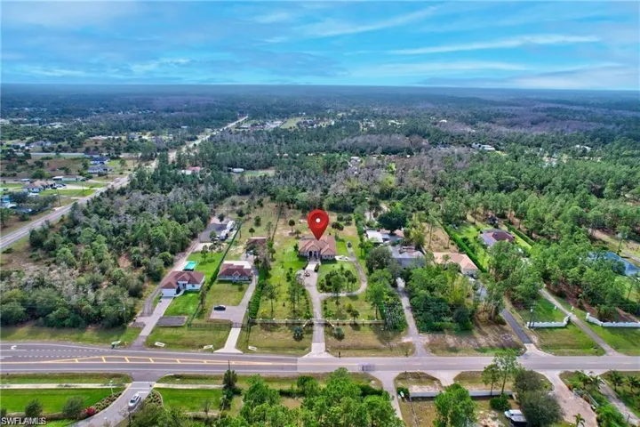 Bird's eye view with a wooded view