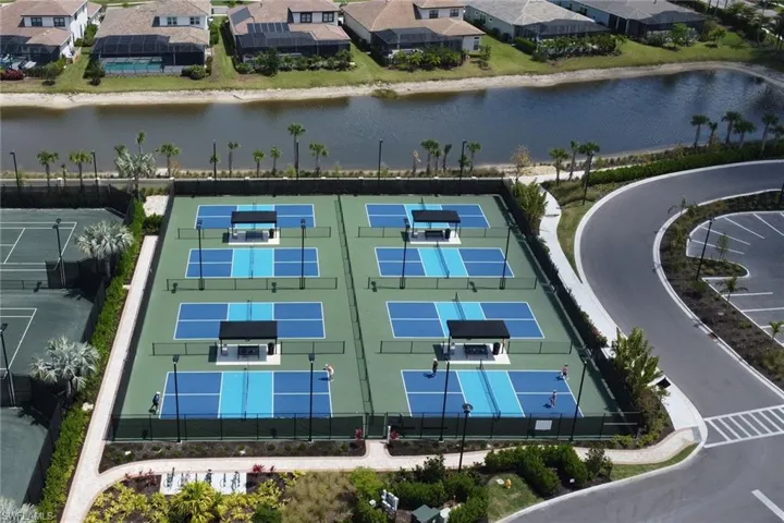 Drone / aerial view with a residential view and a water view