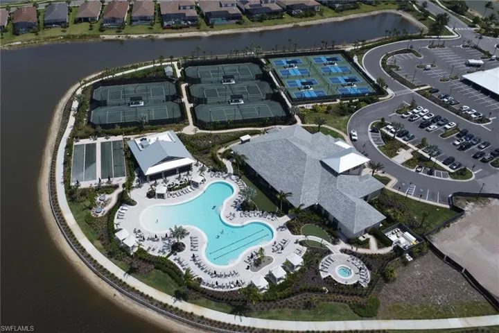 Aerial view featuring a water view and a residential view