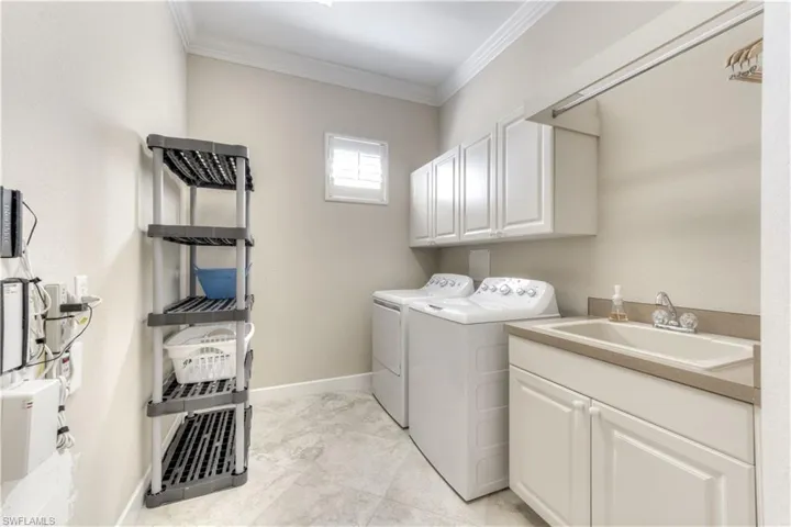Generous Size Laundry Area with Sink