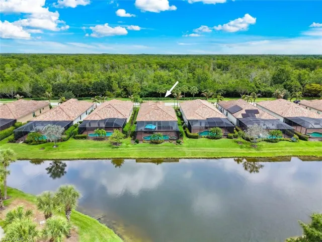 Twin Eagles Home with a screened-in extended lanai with pool, spa and picture screen