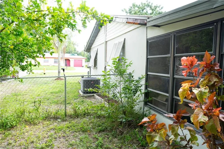 Side yard-fenced.