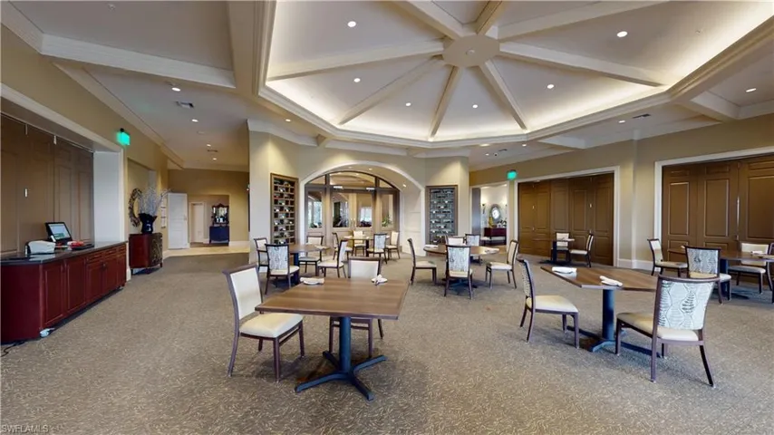 Carpeted dining space featuring coffered ceiling, beamed ceiling, ornamental molding, and recessed lighting