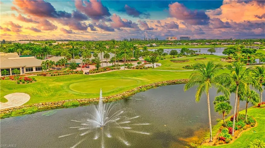 View of community with golf course view and a water view
