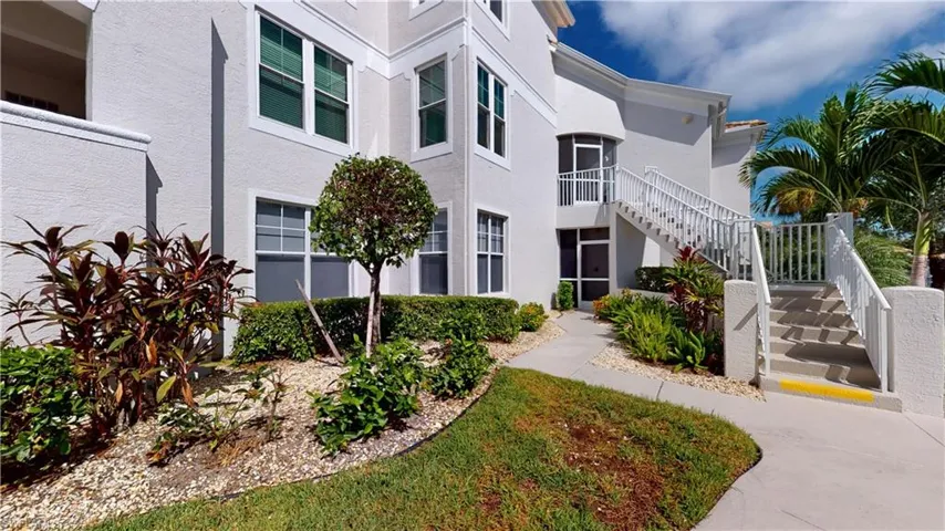 Surrounding community with stairway and a balcony
