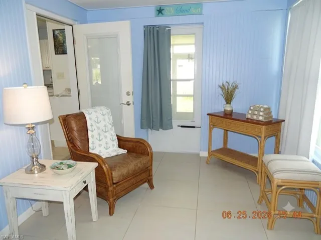 Virtually Staged Light blue vertical paneling on walls