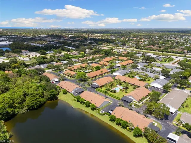 Aerial view of residential area with a large body of water