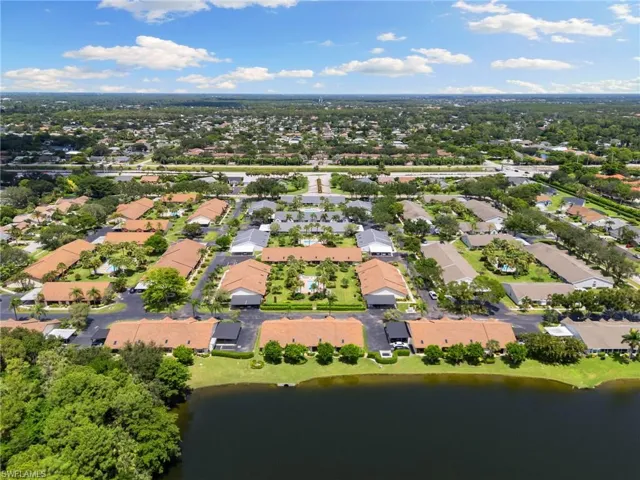 Aerial view of residential area with a large body of water