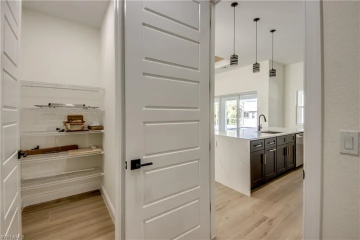 Pantry featuring sink