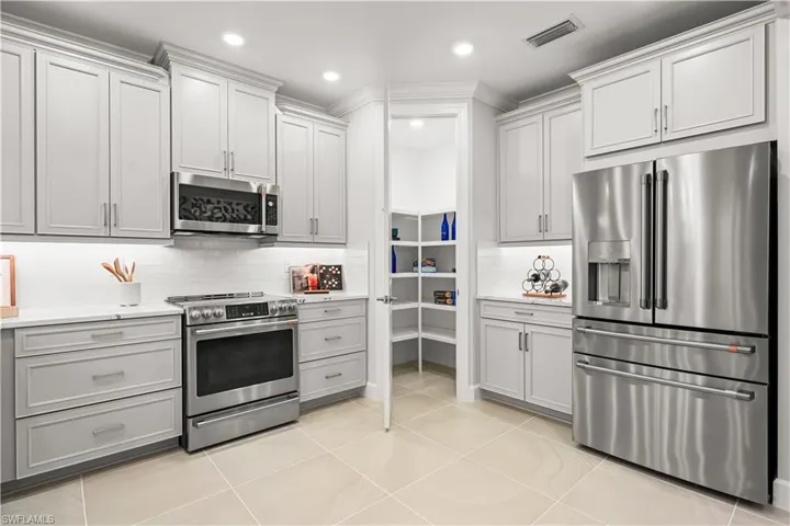 15339 Giardino Drive Unit 103 - Model Home Leaseback - Available Now for Closing!