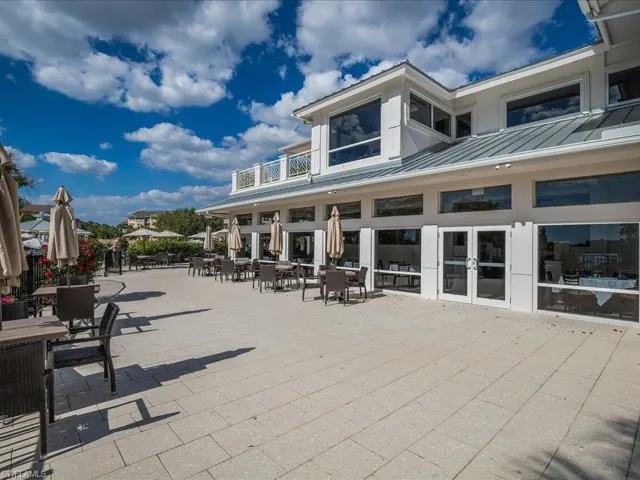 View of patio / terrace with a balcony and french doors