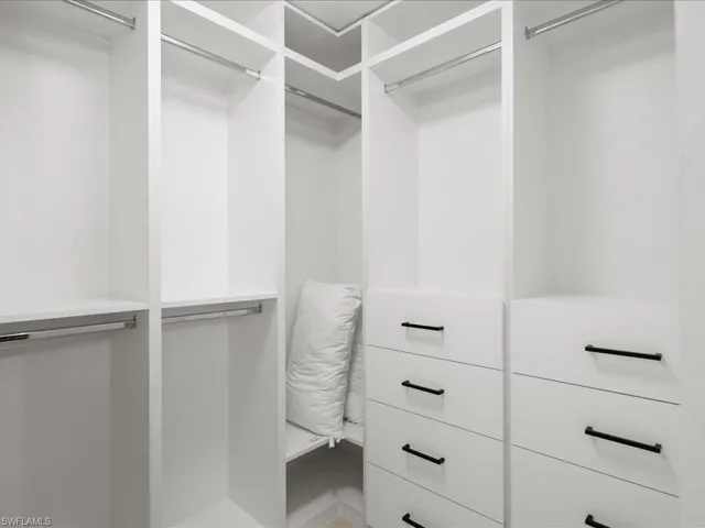 View of spacious master closet