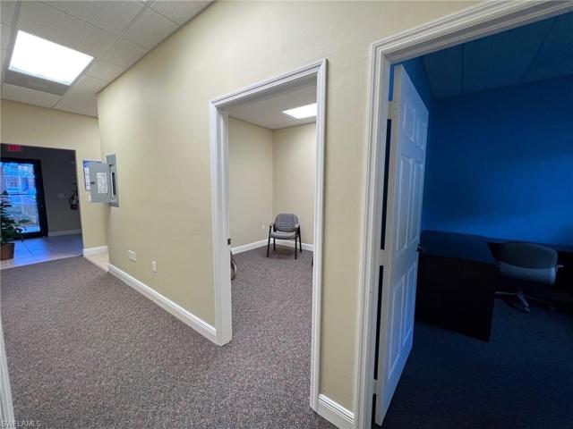 Unit 102 looking down hallway to front entry door