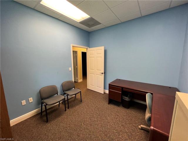 Storage closet at end of hall in Unit 102
