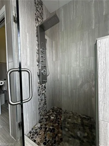 Bathroom with a stall shower