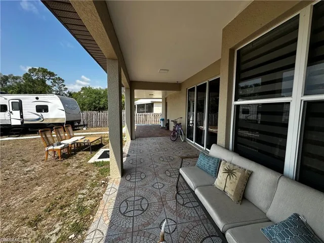 View of patio with outdoor lounge area