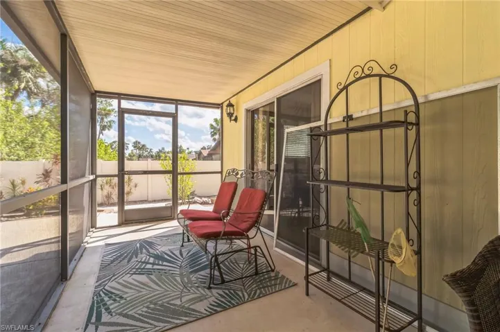 Sunroom / solarium featuring a healthy amount of sunlight