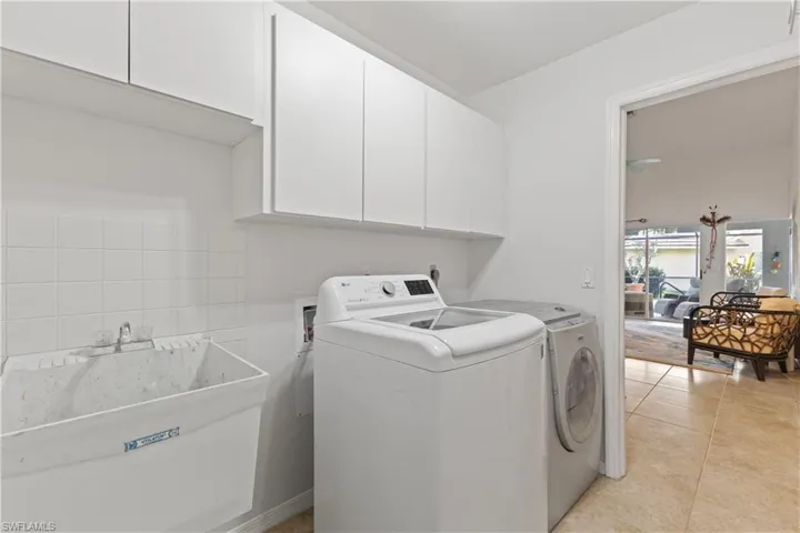 Spacious Laundry with Built-in Cabinets