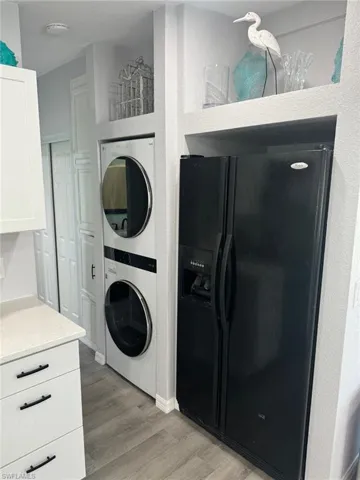Front load full sized washer and dryer inside home