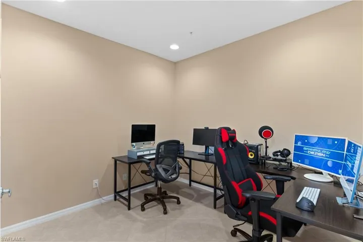 Dedicated room featuring recessed ceiling lighting, light-toned wall paint, and neutral carpet flooring