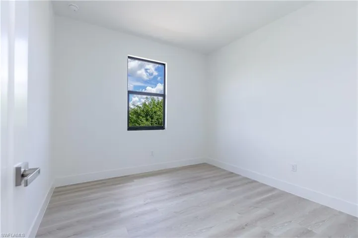 Unfurnished room featuring light hardwood / wood-style floors