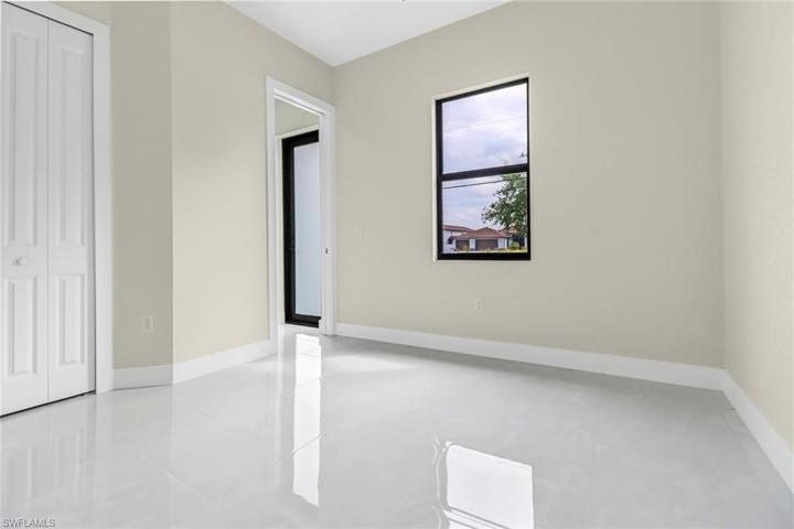 Guest Bedroom One with Full Bath that could easily be a pool bath once your paradise pool is in place.