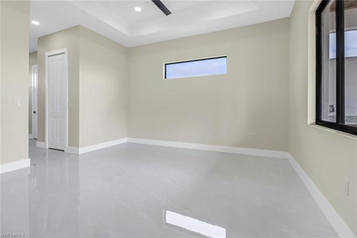 Master Bedroom has two walk-in closets with wooden shelving inside