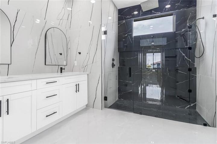 Frameless Glass Shower Door and Rain Shower Head