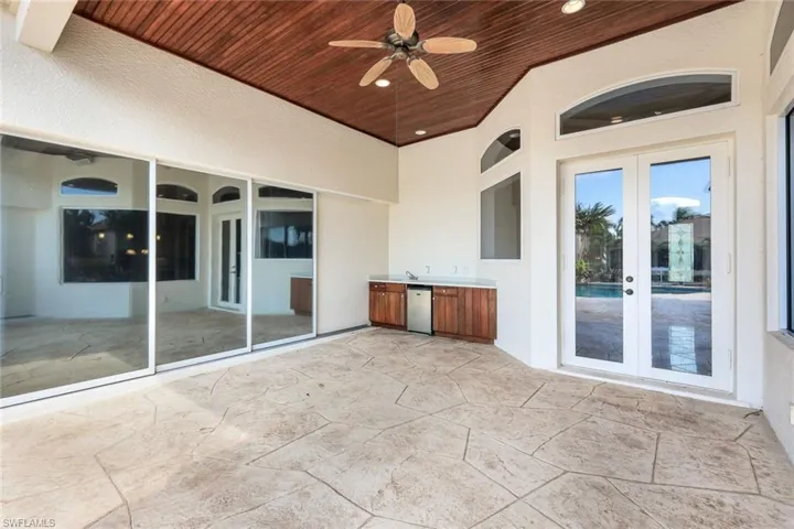 View of patio / terrace with ceiling fan and french doors