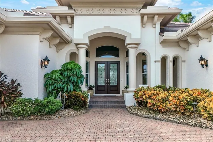 Property entrance with french doors